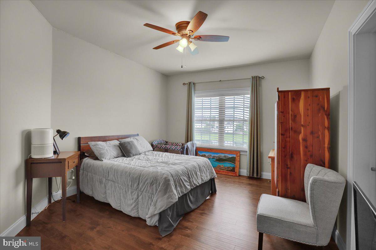 661 Integrity Drive Lititz, PA 17543 - Photo 25 of 37 a bedroom with a bed and a couch