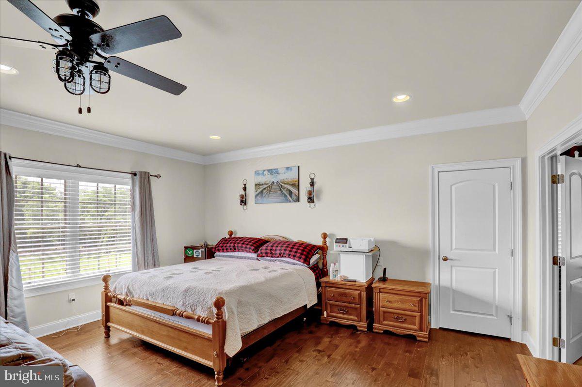 661 Integrity Drive Lititz, PA 17543 - Photo 29 of 37 a bedroom with a bed and a chandelier
