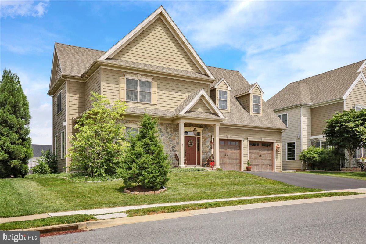 661 Integrity Drive Lititz, PA 17543 - Photo 3 of 37 front view of a house and a yard