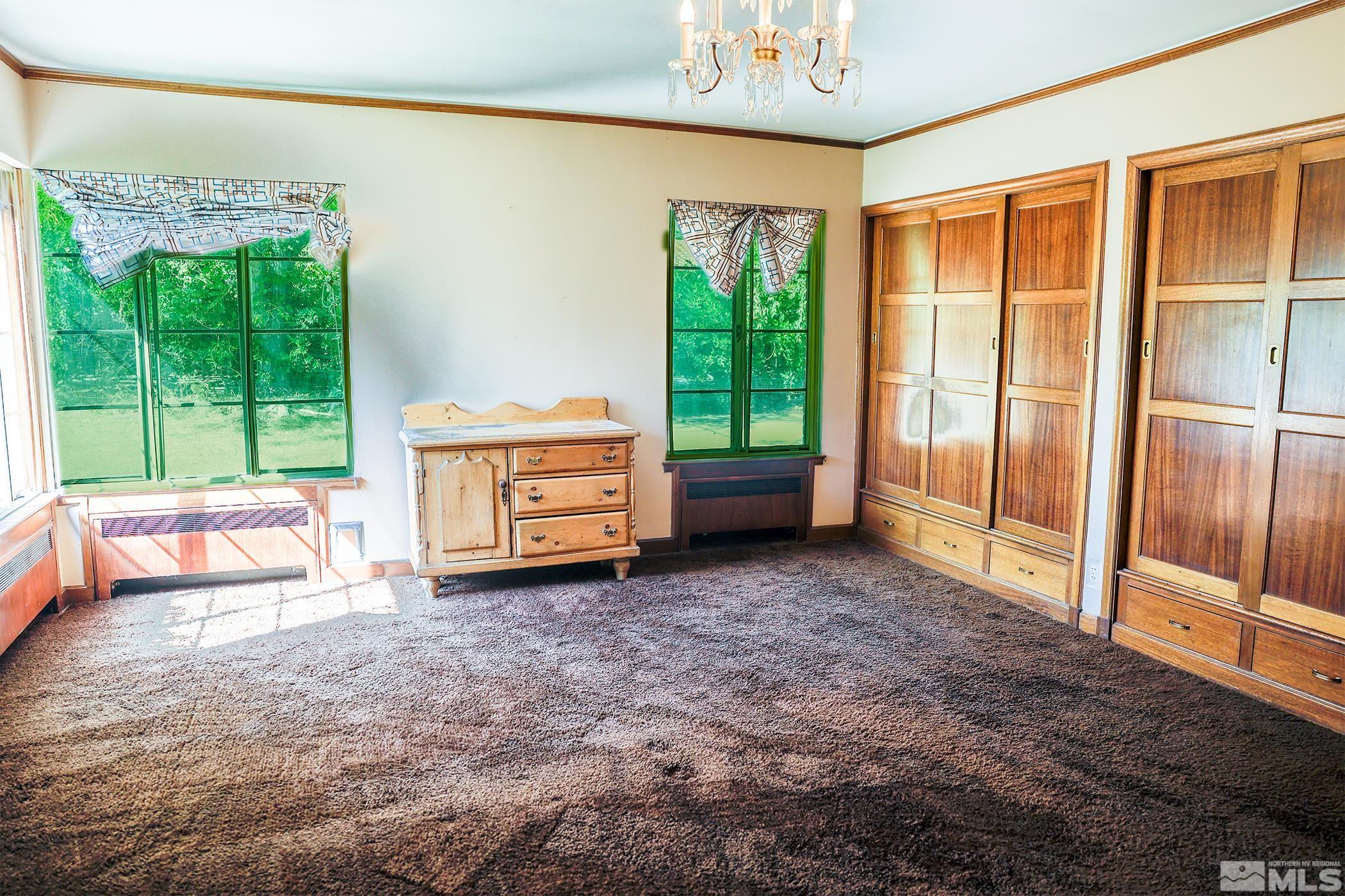 175 Mark Twain Avenue Reno, NV 89509 - Photo 15 of 27 a view of a room with furniture and a large window