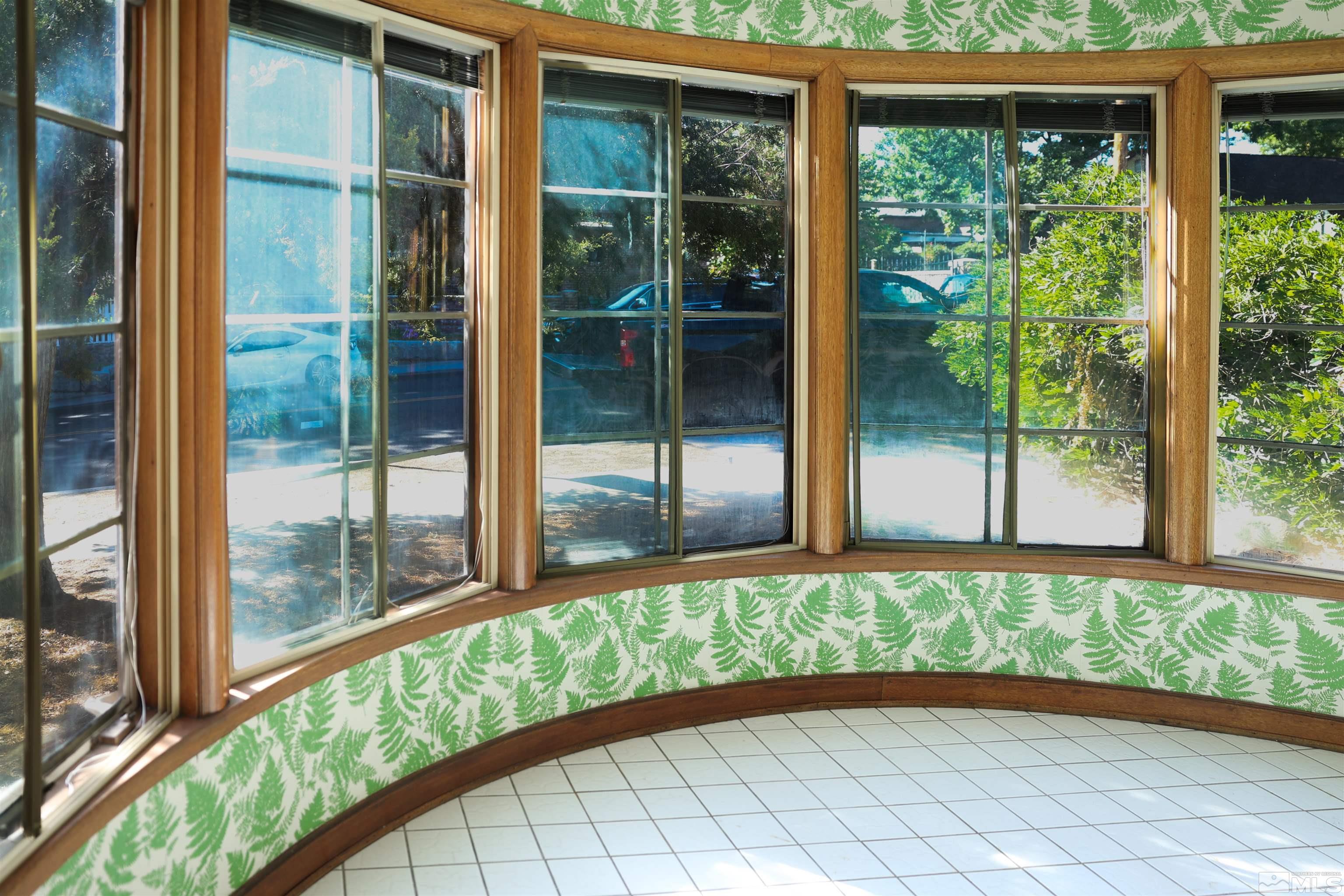 175 Mark Twain Avenue Reno, NV 89509 - Photo 26 of 27 a view of an empty room with a large window