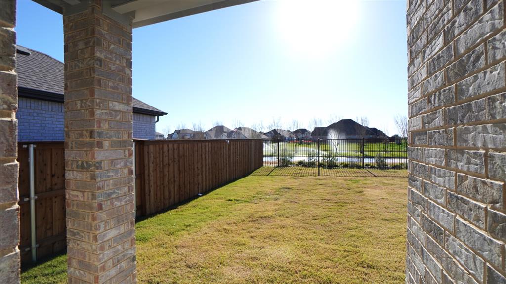1374 Chisos Way Forney, TX 75126 - Photo 23 of 25 a view of a balcony with an ocean view