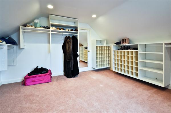 7 Monroe Road Wellesley, MA 02481 - Photo 16 of 22 a view of empty room with cabinet and ceiling fan