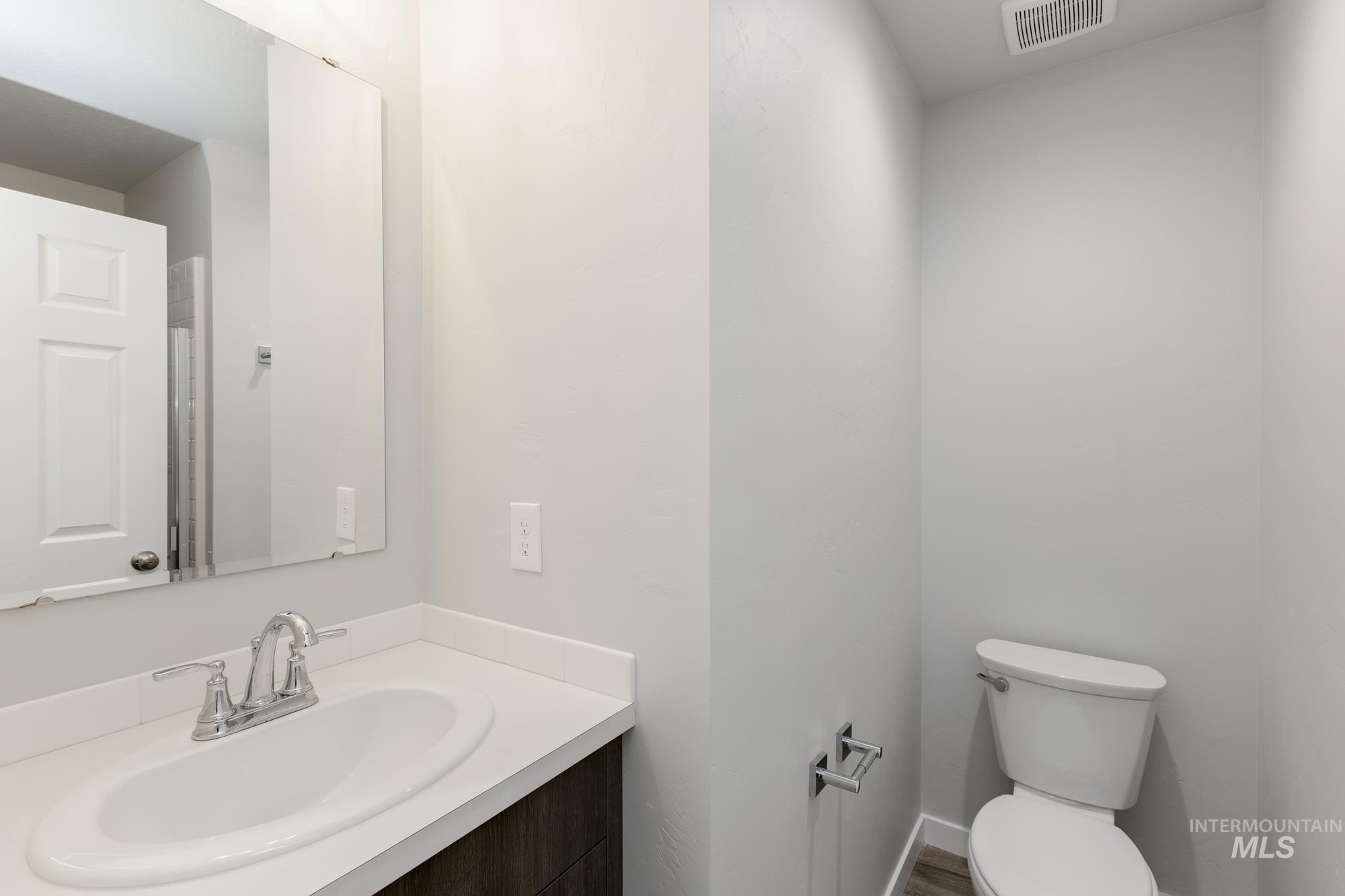 16354 Backfill Avenue Caldwell, ID 83607 - Photo 12 of 25 Bathroom with vanity and toilet