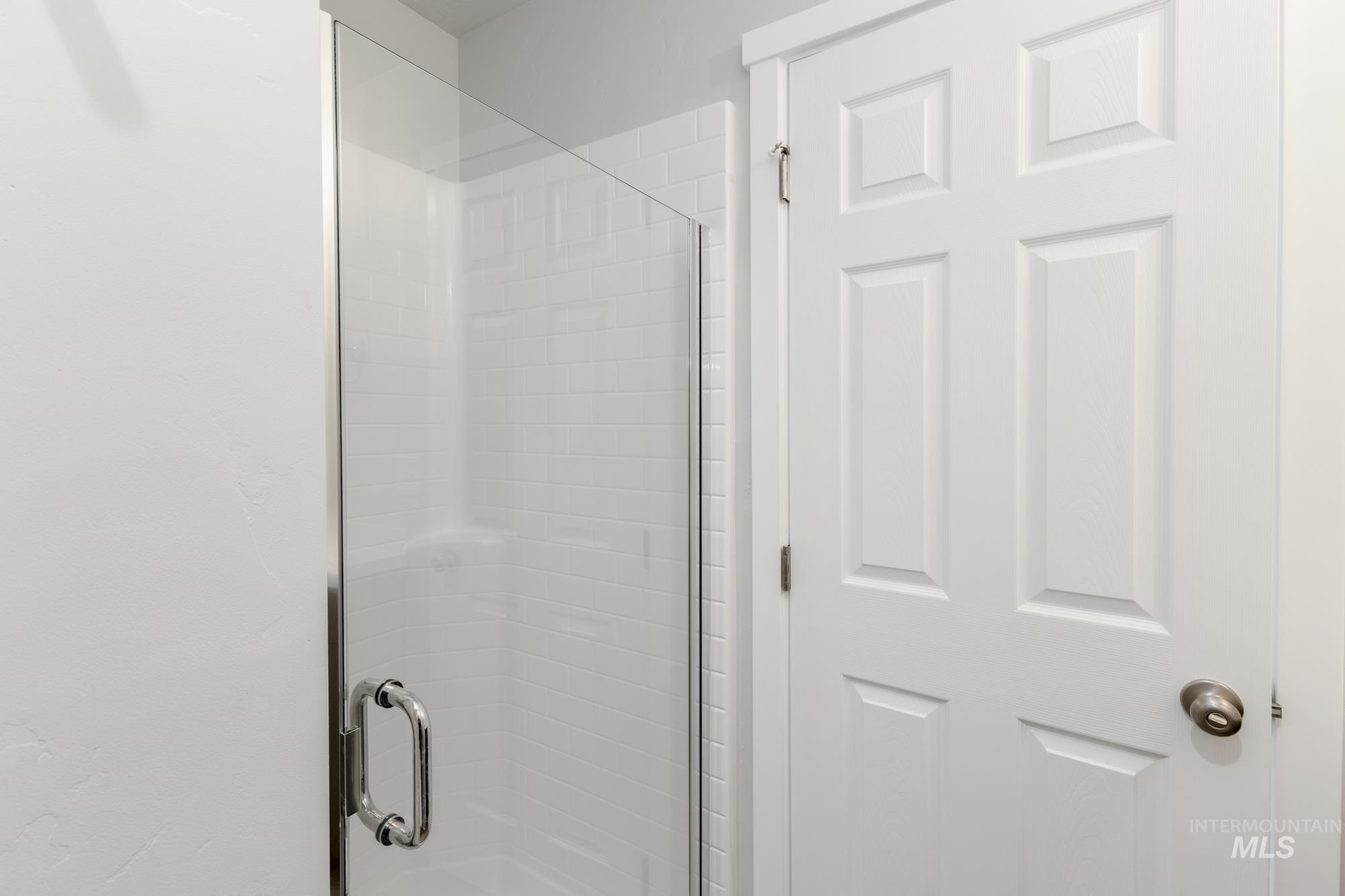 16354 Backfill Avenue Caldwell, ID 83607 - Photo 13 of 25 Full bathroom with a stall shower
