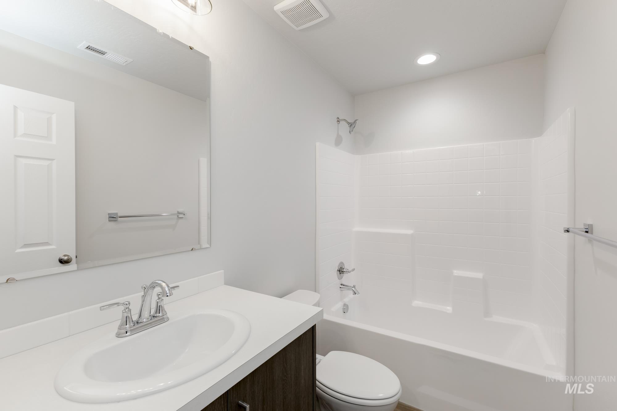 16354 Backfill Avenue Caldwell, ID 83607 - Photo 18 of 25 Bathroom featuring vanity, shower / tub combination, and recessed lighting