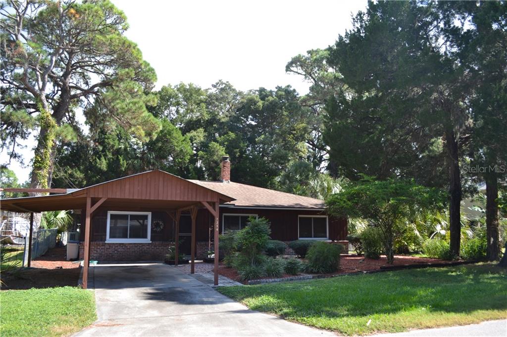 7214 Pinewood Drive New Port Richey, FL 34652 - Photo 1 of 1 Nicely Landscaped and peaceful