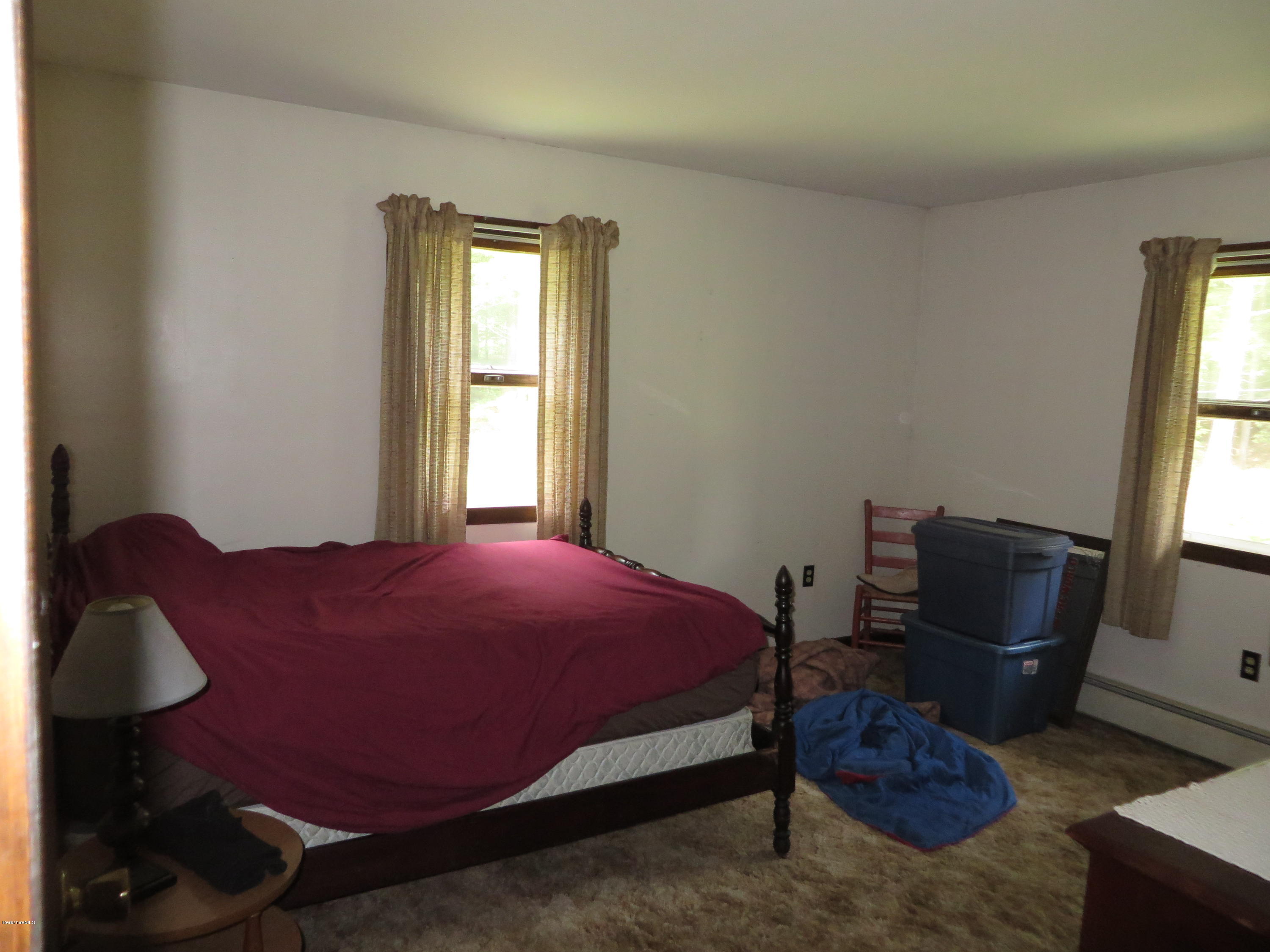 929 South Washington State Road Washington, MA 01223 - Photo 14 of 24 a bedroom with a bed chair and window