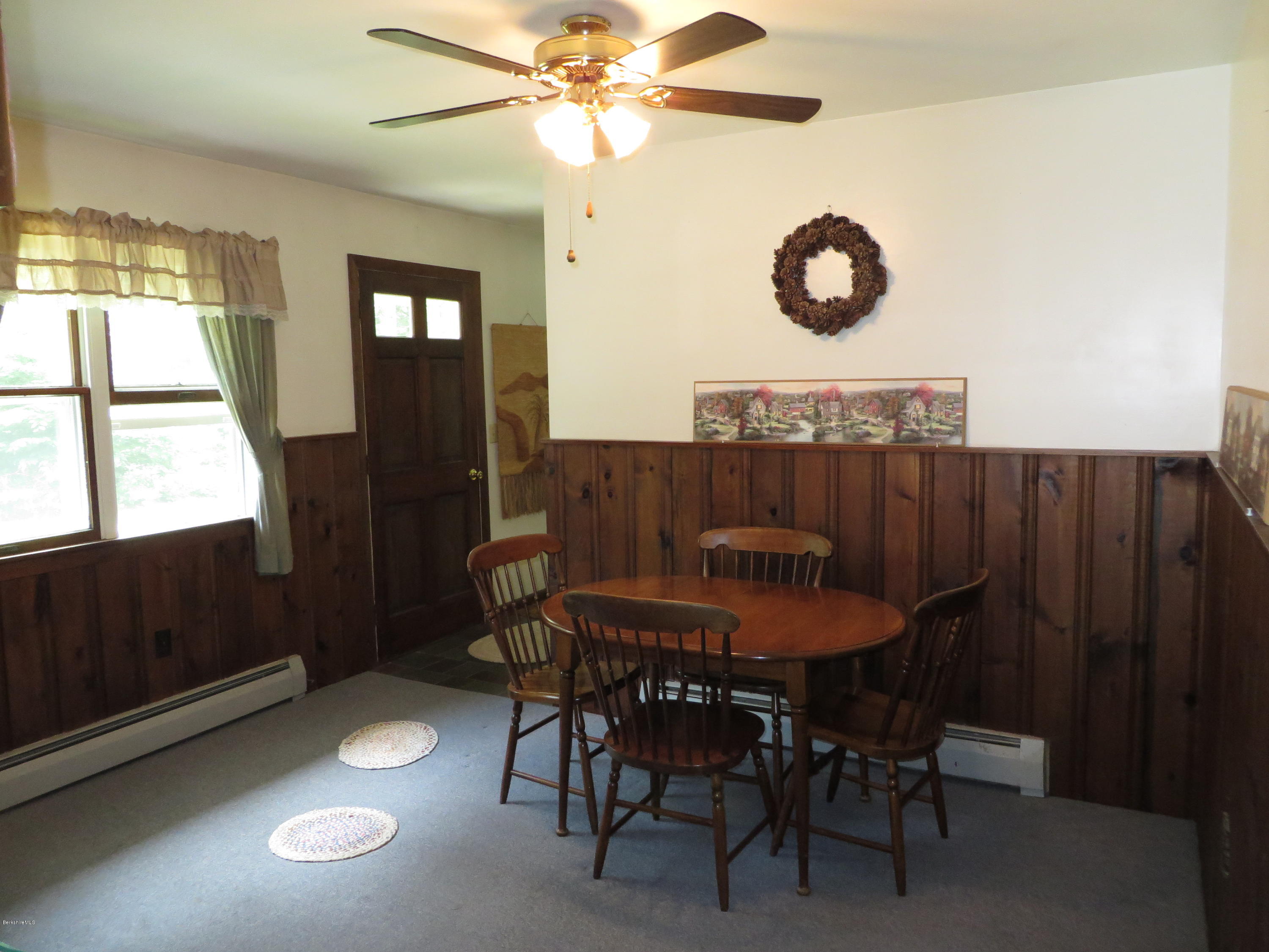 929 South Washington State Road Washington, MA 01223 - Photo 8 of 24 a view of a dining room with furniture and window