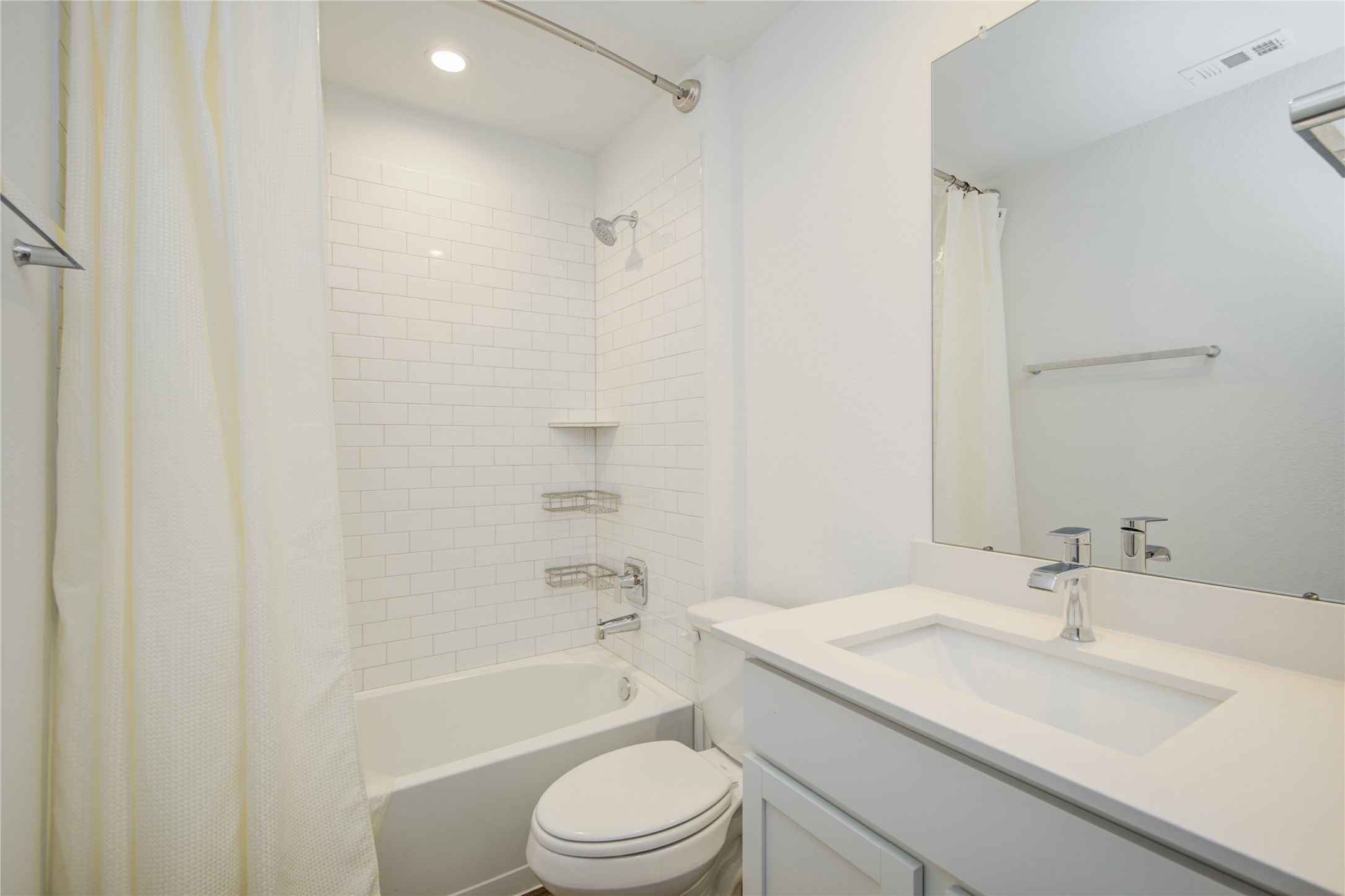 7802 Murciana Drive Rosharon, TX 77583 - Photo 12 of 35 a bathroom with a sink toilet vanity and shower
