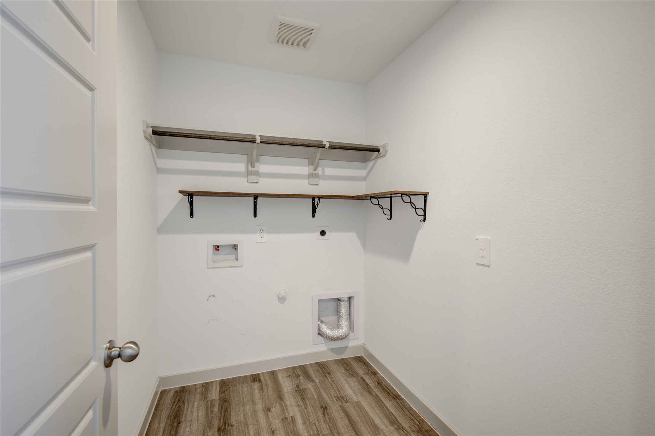 7802 Murciana Drive Rosharon, TX 77583 - Photo 20 of 35 a view of a room with racks on the wall