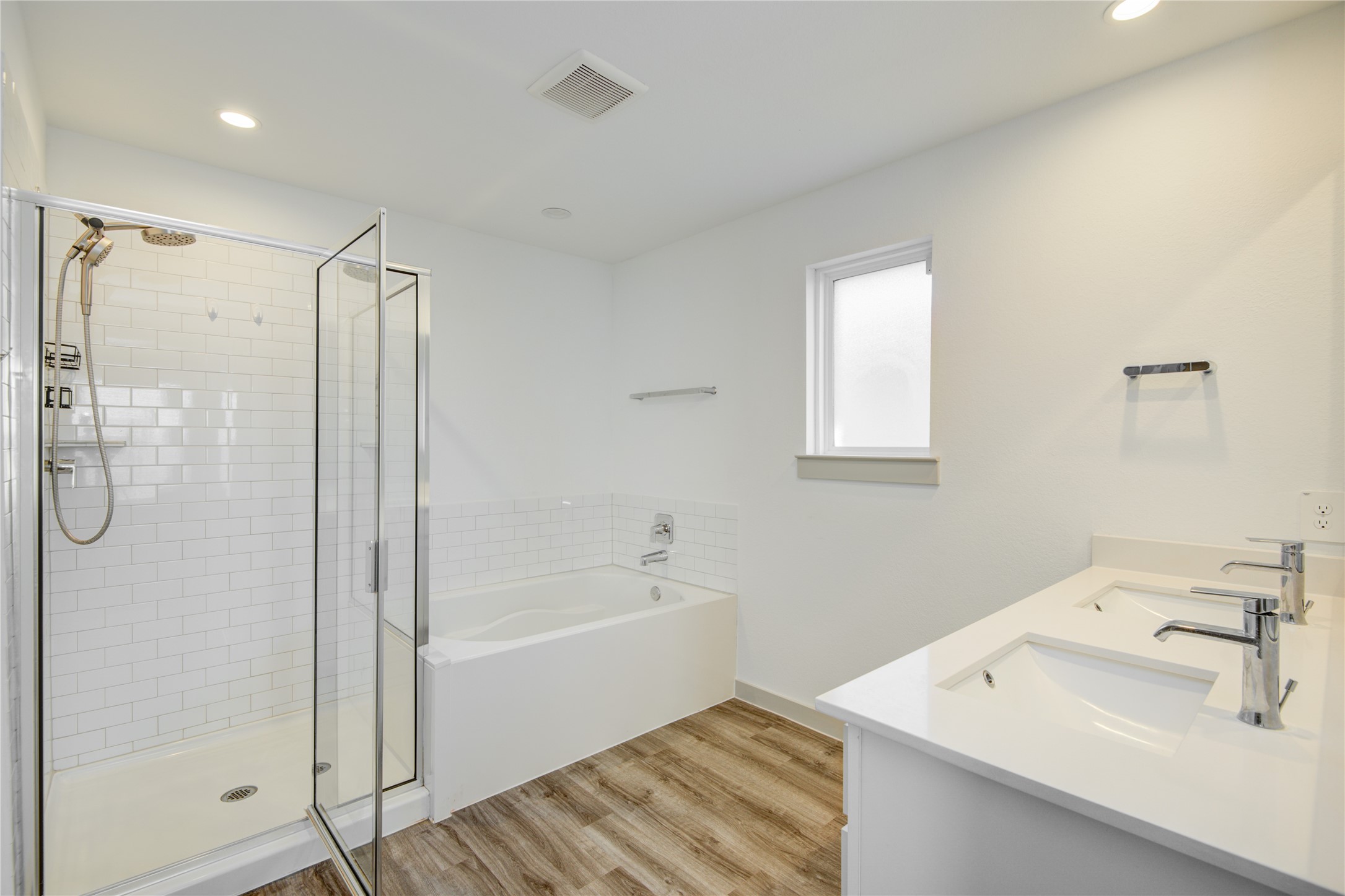 7802 Murciana Drive Rosharon, TX 77583 - Photo 27 of 35 a bathroom with a bathtub shower sink vanity and toilet