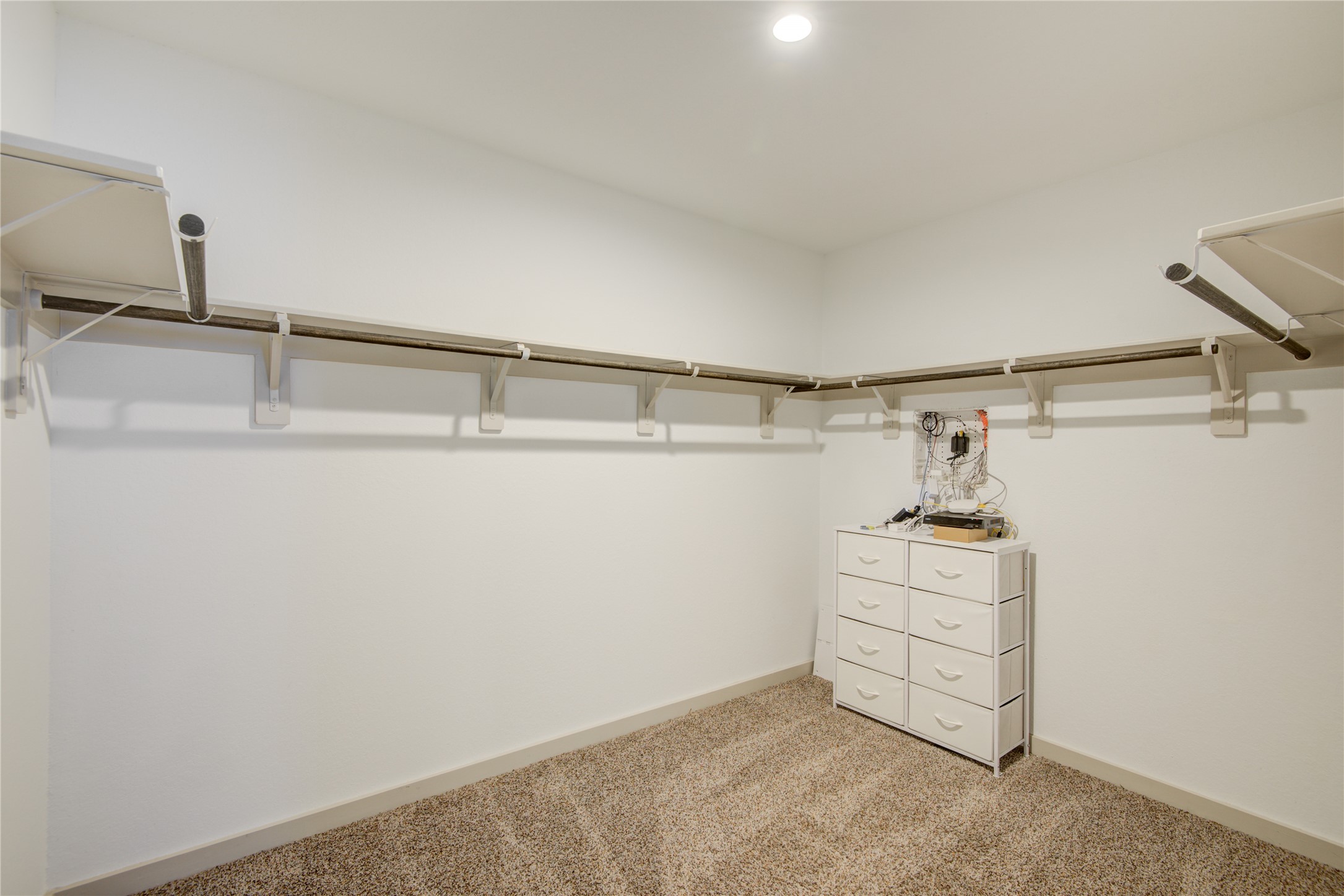7802 Murciana Drive Rosharon, TX 77583 - Photo 30 of 35 a view of a room with racks on the wall