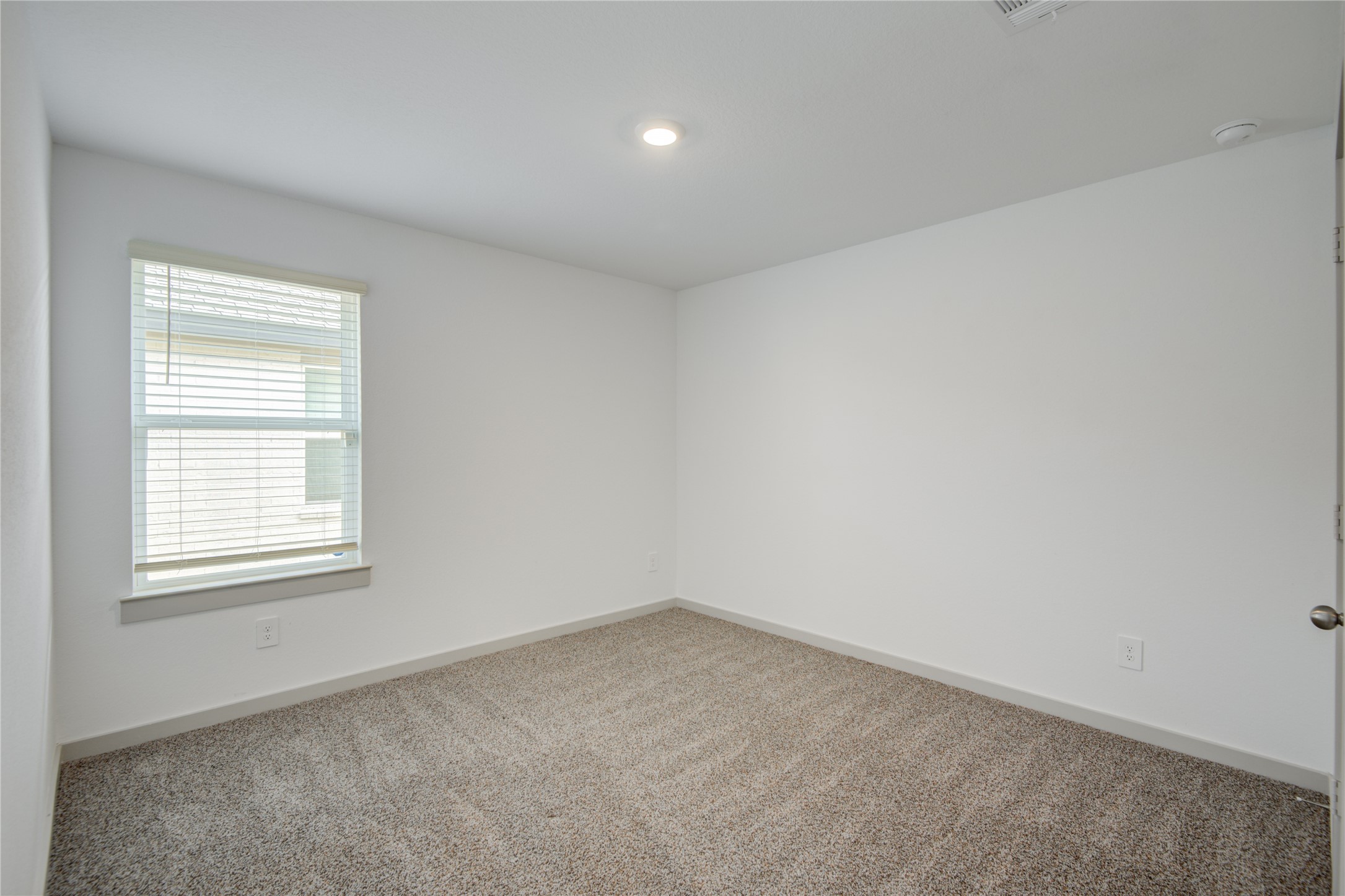 7802 Murciana Drive Rosharon, TX 77583 - Photo 10 of 35 an empty room with a window
