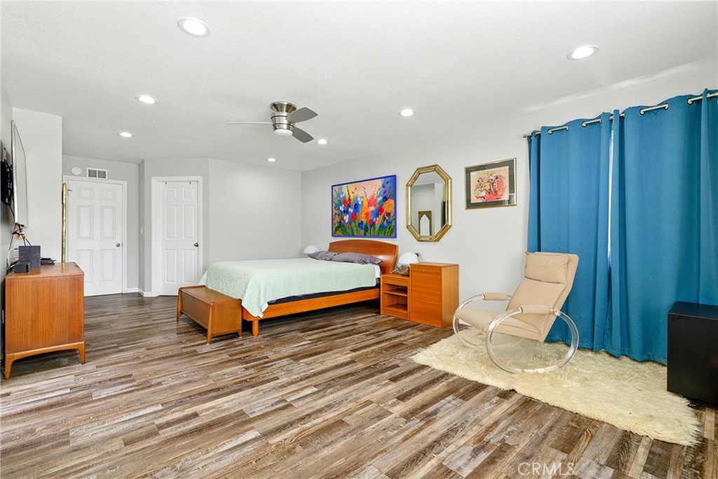 3101 Maple Avenue Fullerton, CA 92835 - Photo 16 of 46 a bedroom with furniture and a wooden floor