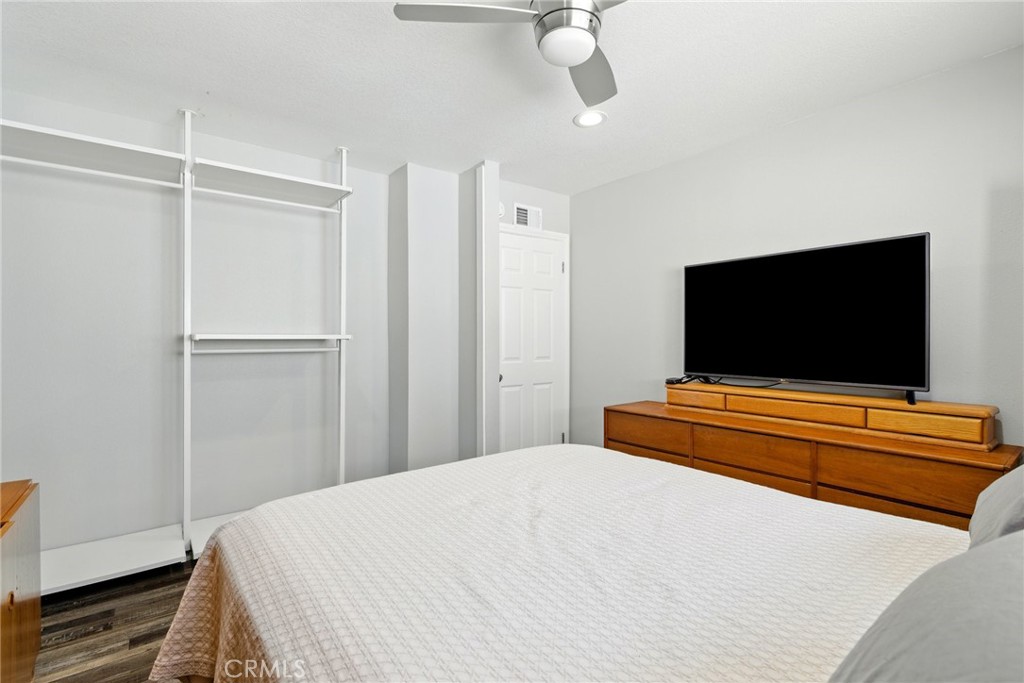 3101 Maple Avenue Fullerton, CA 92835 - Photo 21 of 46 a bedroom with a flat screen tv and a bed