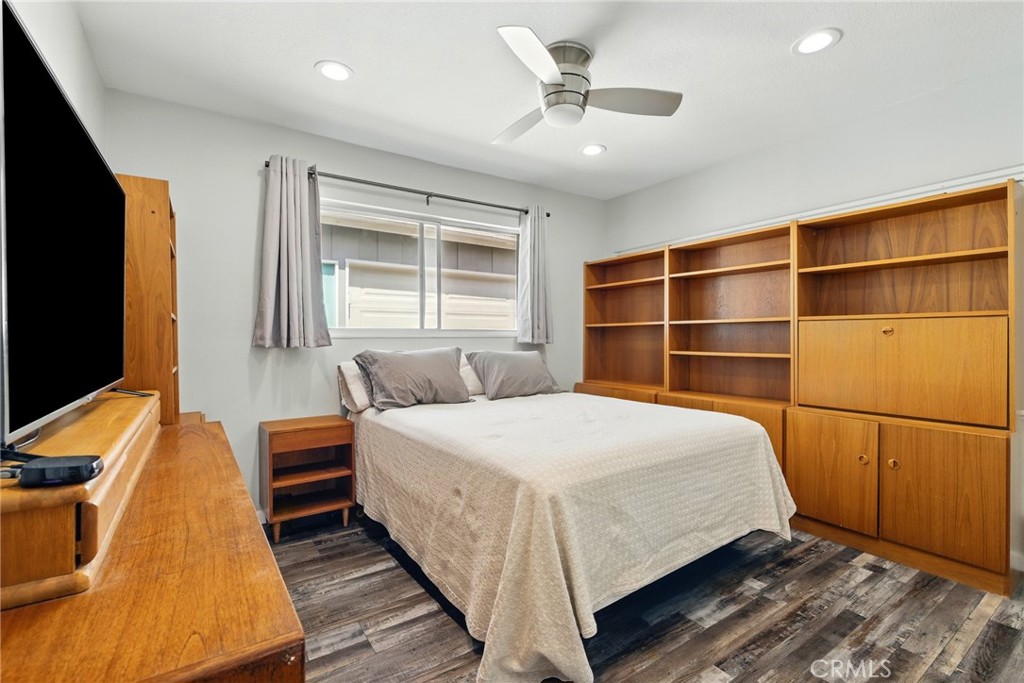 3101 Maple Avenue Fullerton, CA 92835 - Photo 23 of 46 a bedroom with a bed and a flat screen tv