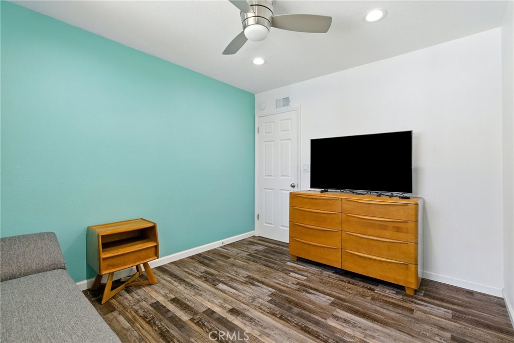 3101 Maple Avenue Fullerton, CA 92835 - Photo 24 of 46 a room with furniture and flat screen tv