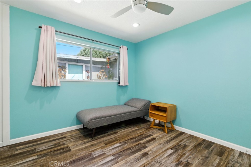3101 Maple Avenue Fullerton, CA 92835 - Photo 25 of 46 a room with a window and a wooden floor