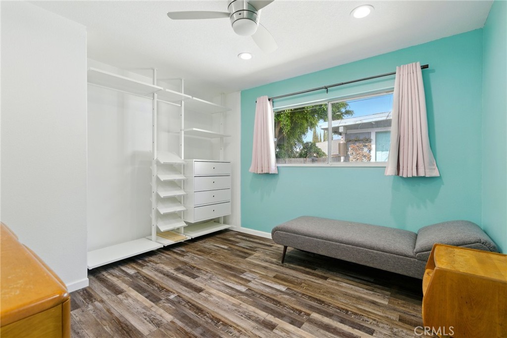 3101 Maple Avenue Fullerton, CA 92835 - Photo 26 of 46 a room with furniture and a wooden floor