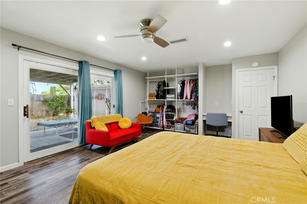 3101 Maple Avenue Fullerton, CA 92835 - Photo 28 of 46 a bedroom with a bed and wooden floor