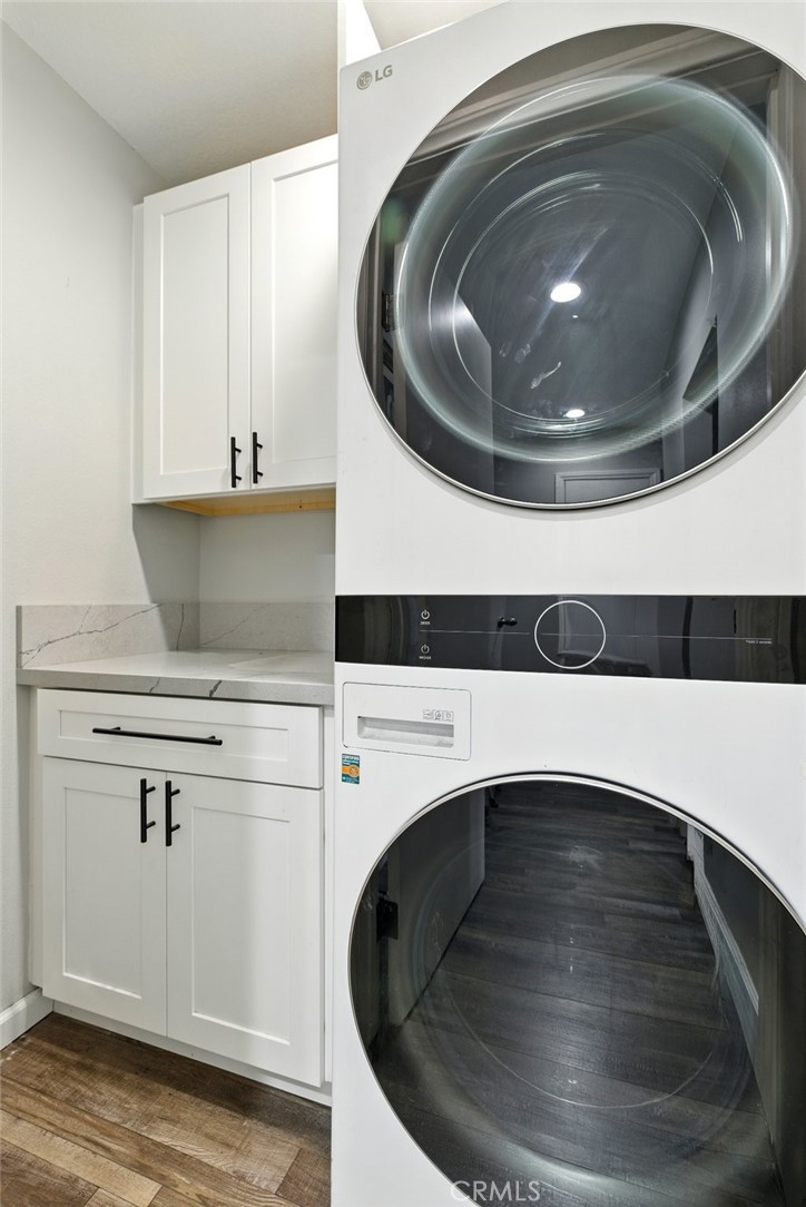 3101 Maple Avenue Fullerton, CA 92835 - Photo 30 of 46 a utility room with wooden floor