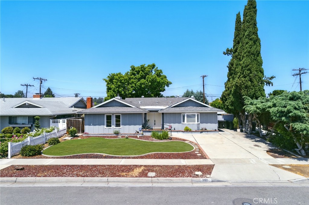 3101 Maple Avenue Fullerton, CA 92835 - Photo 31 of 46 a front view of a house with a yard