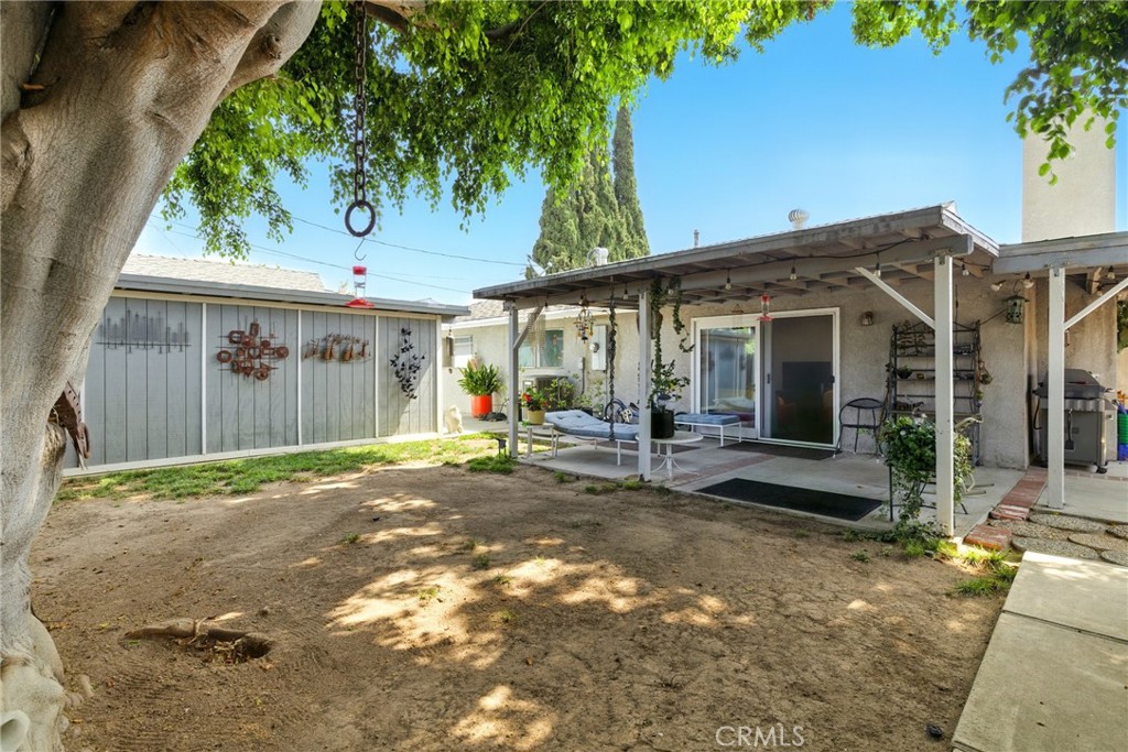 3101 Maple Avenue Fullerton, CA 92835 - Photo 33 of 46 a view of a house with backyard porch and sitting area
