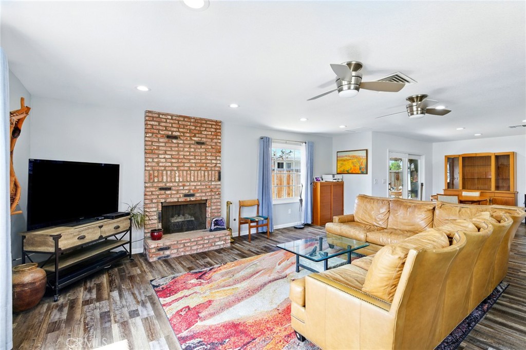 3101 Maple Avenue Fullerton, CA 92835 - Photo 6 of 46 a living room with furniture and a flat screen tv