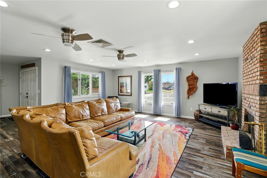 3101 Maple Avenue Fullerton, CA 92835 - Photo 7 of 46 a living room with furniture and a flat screen tv