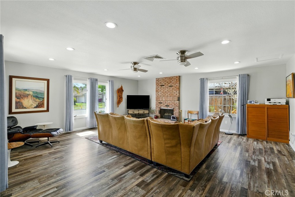 3101 Maple Avenue Fullerton, CA 92835 - Photo 9 of 46 a living room with furniture and a flat screen tv