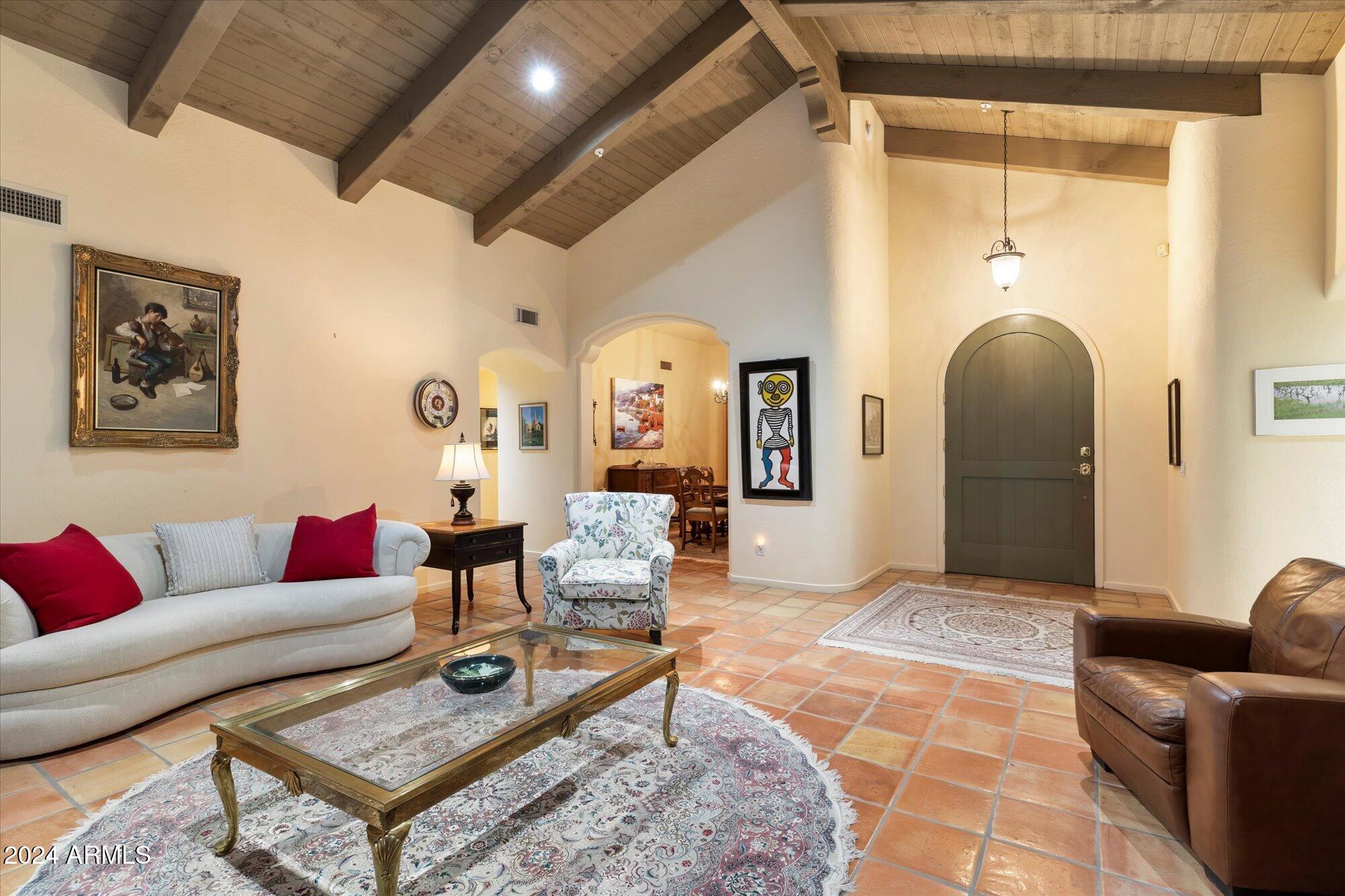 25255 North Ranch Gate Road Scottsdale, AZ 85255 - Photo 13 of 68 a living room with furniture and wooden floor