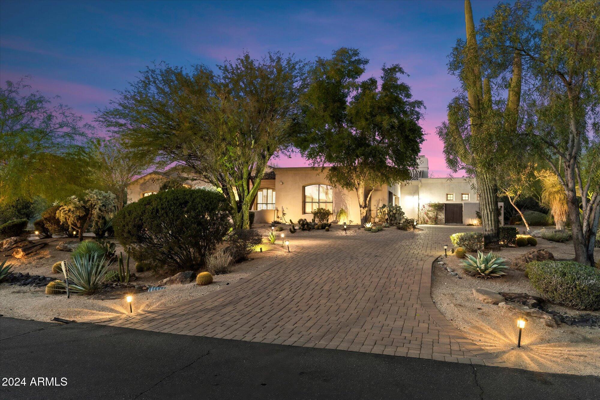 25255 North Ranch Gate Road Scottsdale, AZ 85255 - Photo 2 of 68 a view of a house with a patio