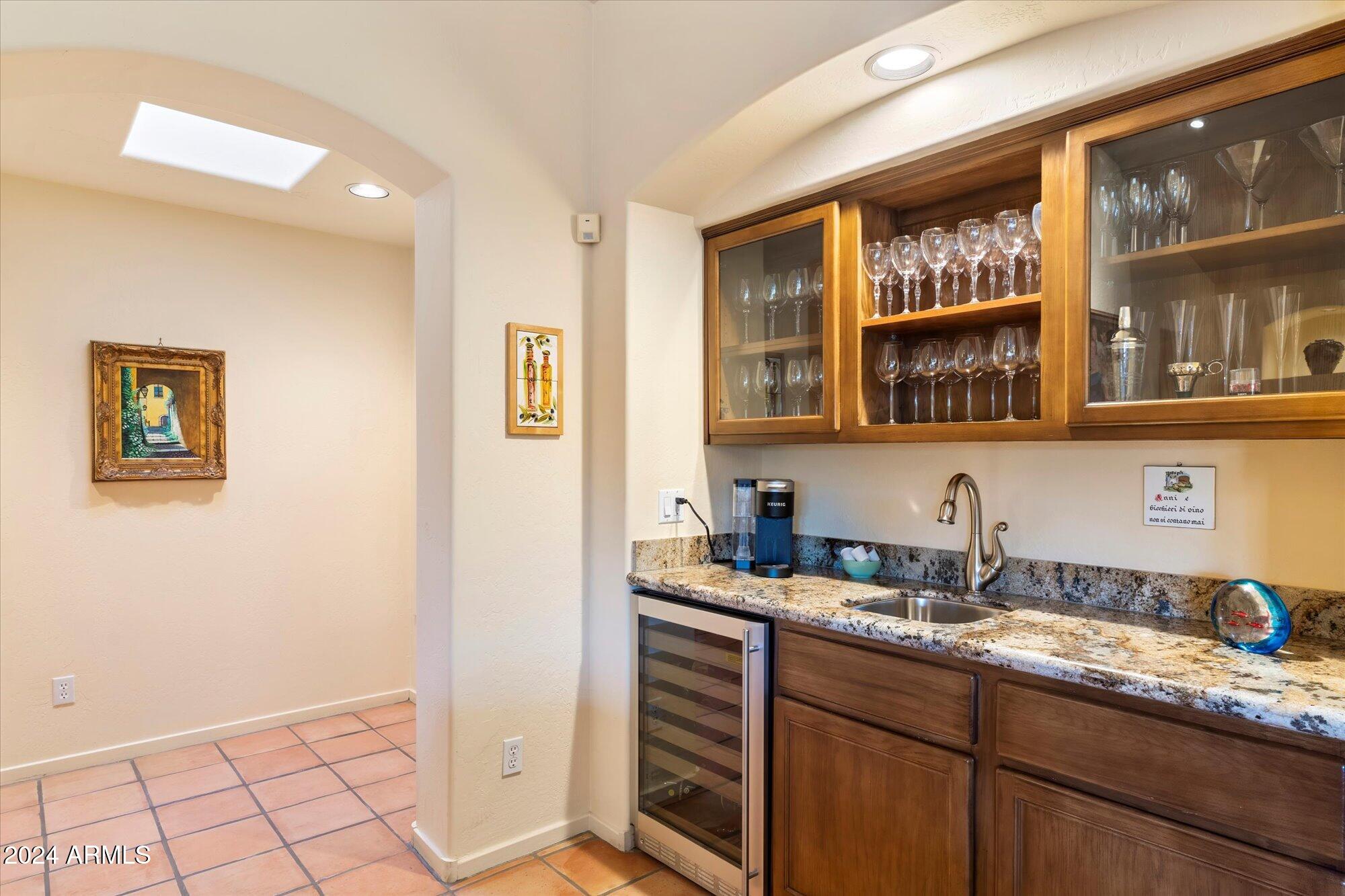 25255 North Ranch Gate Road Scottsdale, AZ 85255 - Photo 24 of 68 a bathroom with a sink and a mirror