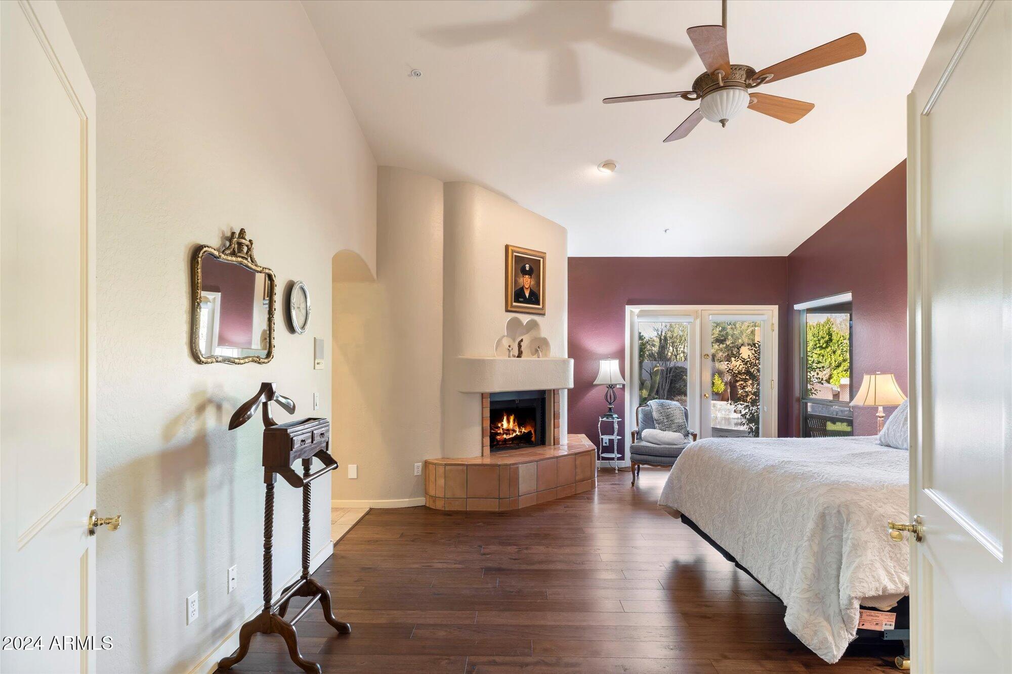 25255 North Ranch Gate Road Scottsdale, AZ 85255 - Photo 25 of 68 a living room with furniture and a fireplace