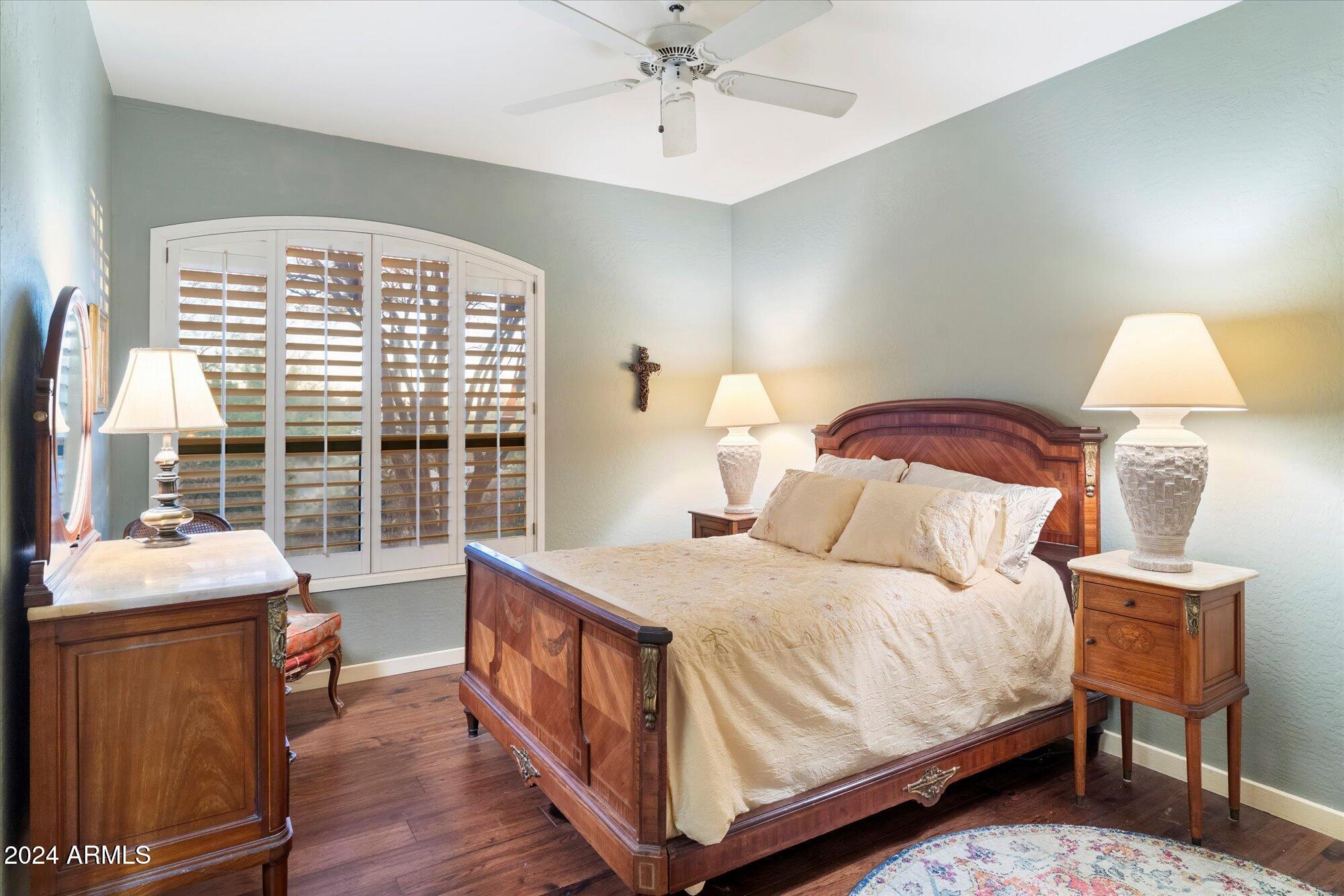 25255 North Ranch Gate Road Scottsdale, AZ 85255 - Photo 33 of 68 a bedroom with a bed and a table