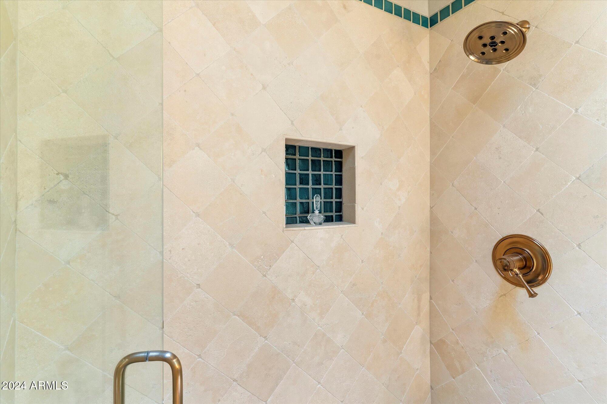 25255 North Ranch Gate Road Scottsdale, AZ 85255 - Photo 40 of 68 a close up of a shower