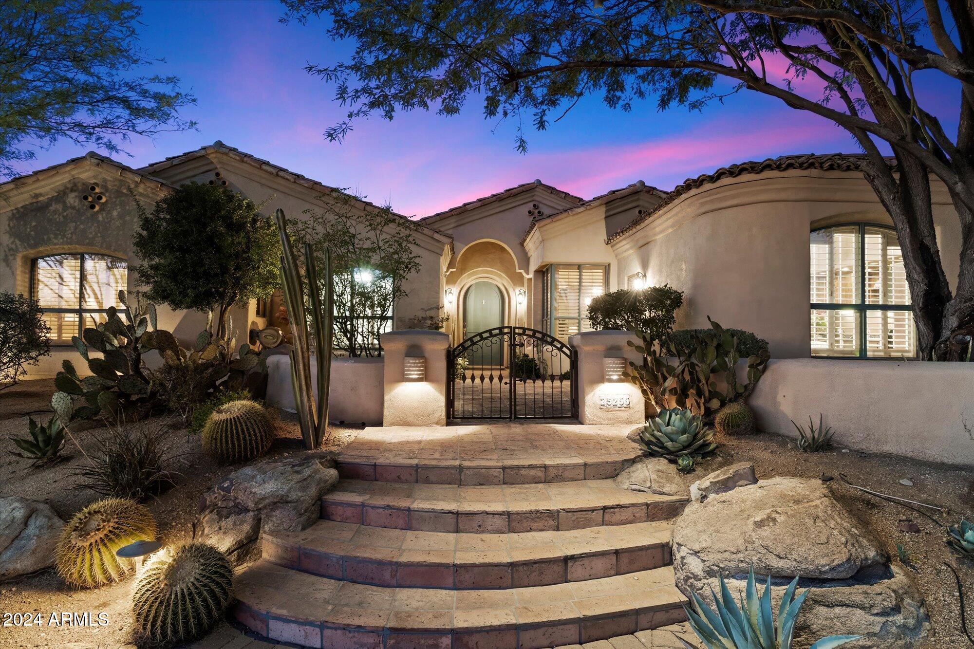 25255 North Ranch Gate Road Scottsdale, AZ 85255 - Photo 4 of 68 a front view of a house