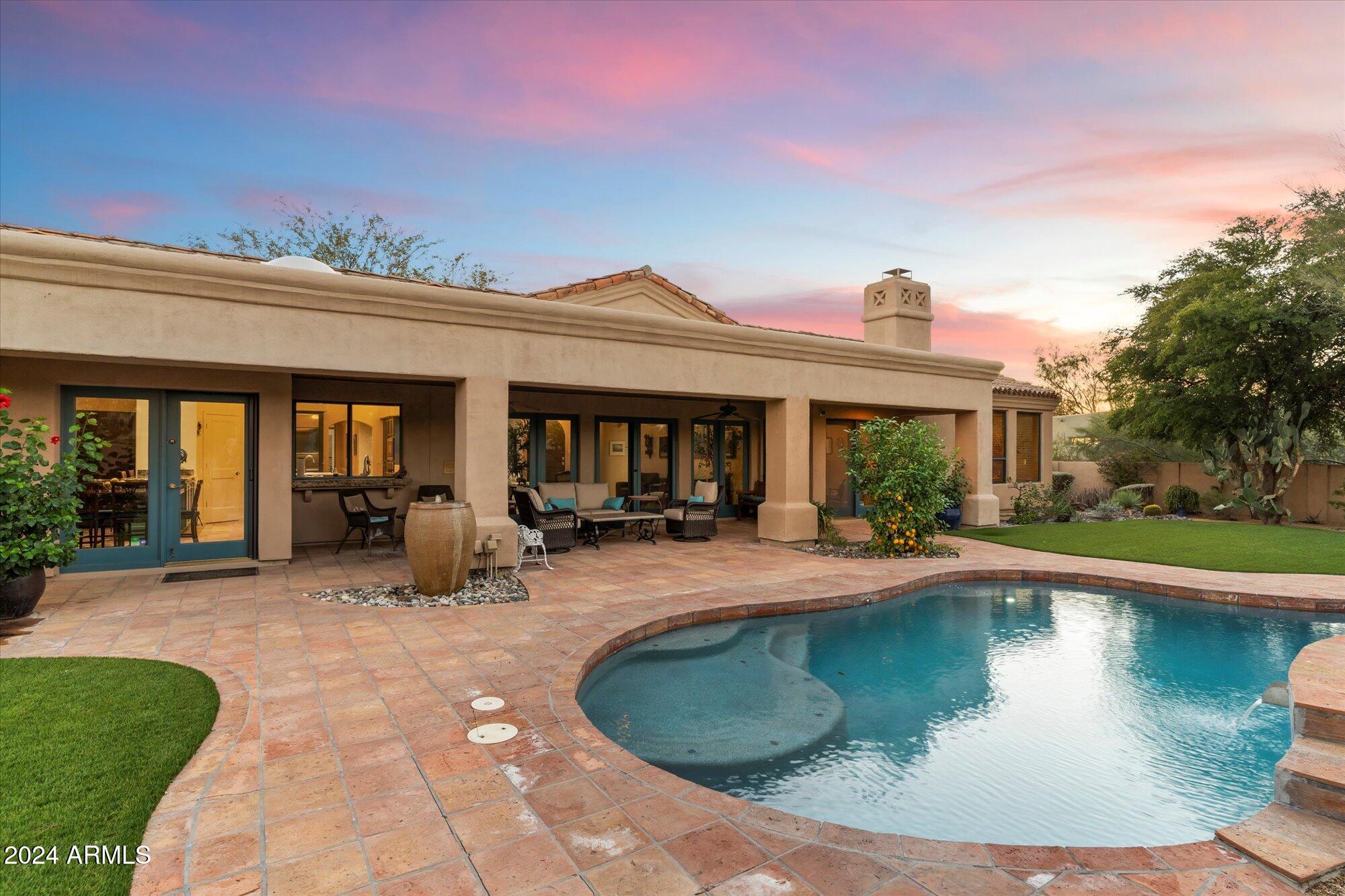 25255 North Ranch Gate Road Scottsdale, AZ 85255 - Photo 57 of 68 a view of a house with roof deck