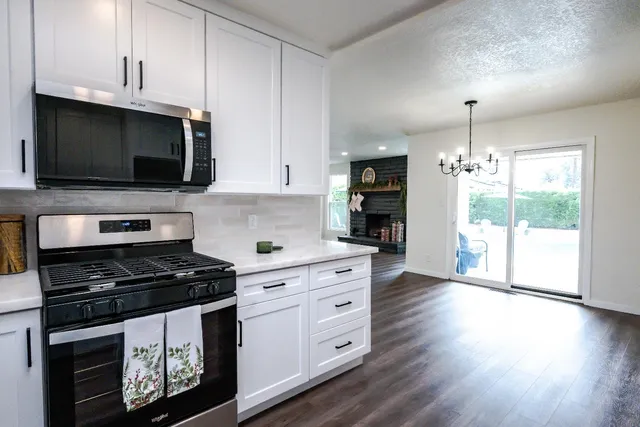 a view of room with wooden floor