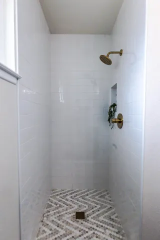 a view of an empty walk in closet