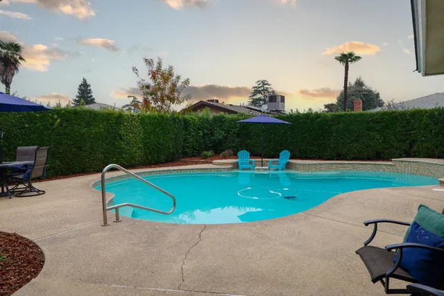 a view of a terrace with sitting area