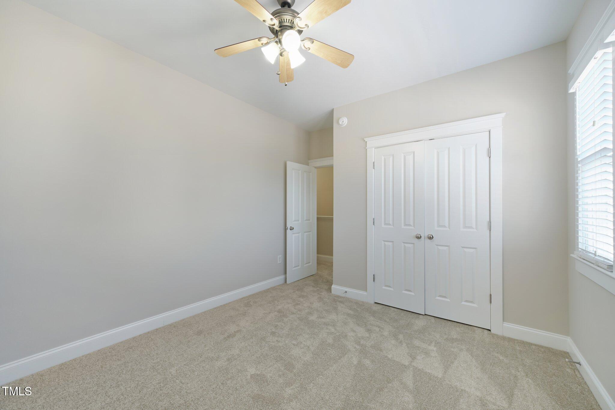 304 Frontgate Drive Cary, NC 27519 - Photo 25 of 41 a view of an empty room with a window