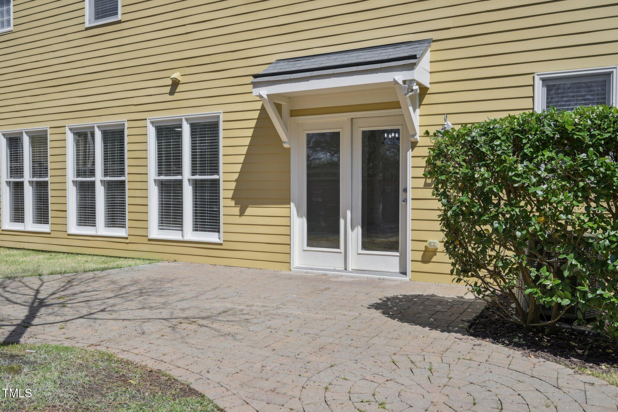 304 Frontgate Drive Cary, NC 27519 - Photo 40 of 41 a front view of a house with garden