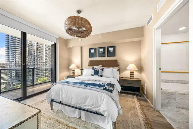 a spacious bathroom with a double vanity sink mirror double and bathtub