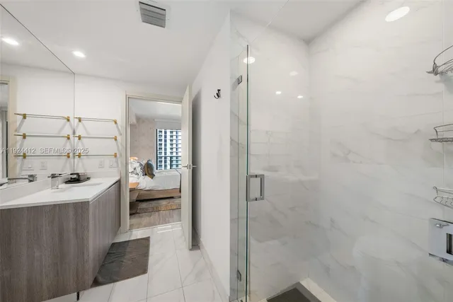 a kitchen with a table and chairs in it