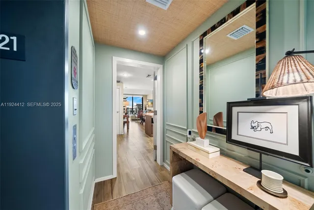 a outdoor space with lots of white furniture and a couch