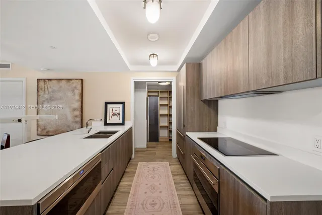 a bedroom with a large bed and a large window