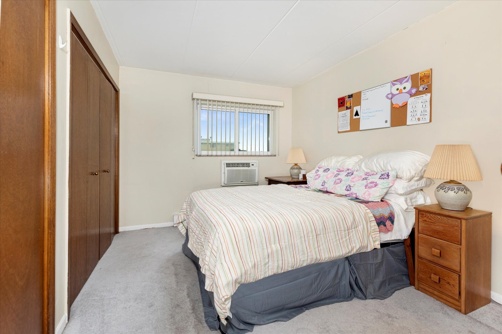 300 Circle Avenue, Unit 5H Forest Park, IL 60130 - Photo 13 of 21 a bedroom with a bed and painting on the wall