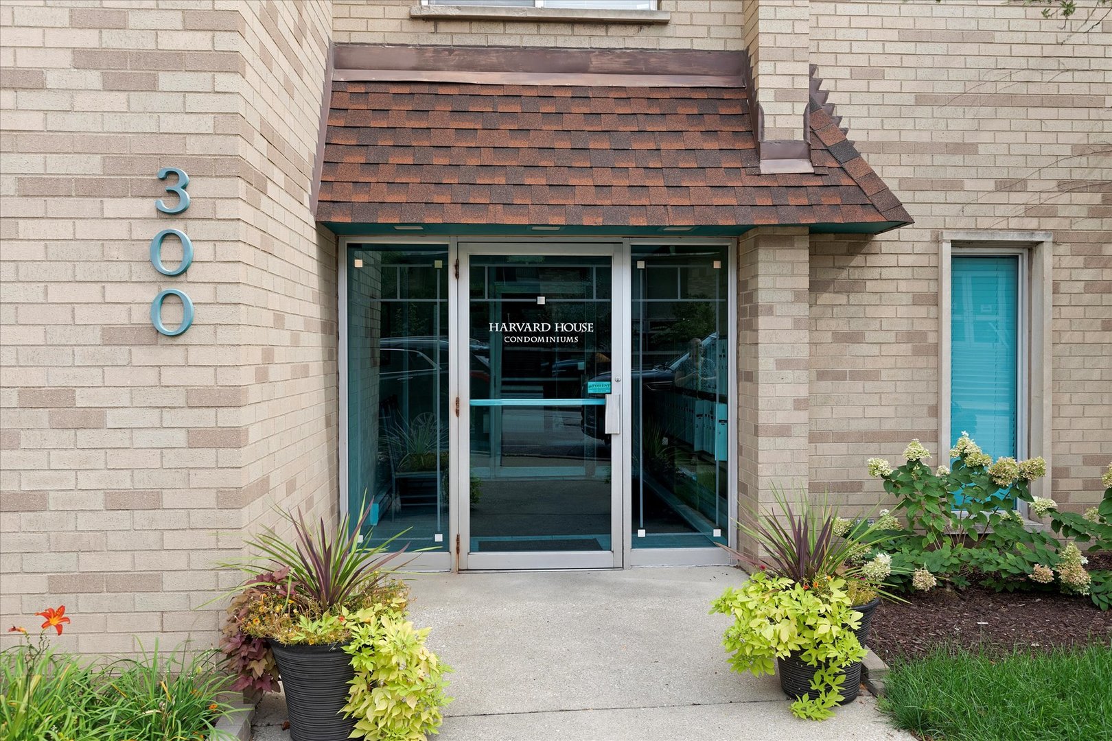 300 Circle Avenue, Unit 5H Forest Park, IL 60130 - Photo 2 of 21 a front view of a house with a garden